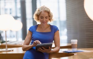 Woman working on device protected by Defender for Office 365