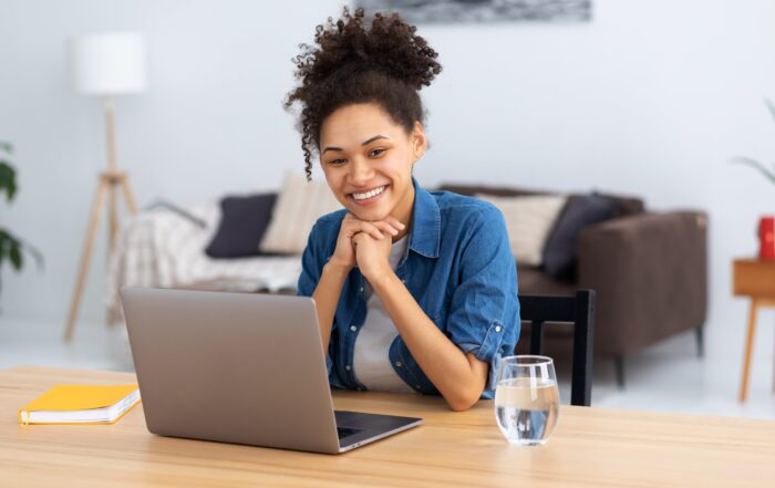 Woman working on device enabled by Intune and Autopilot