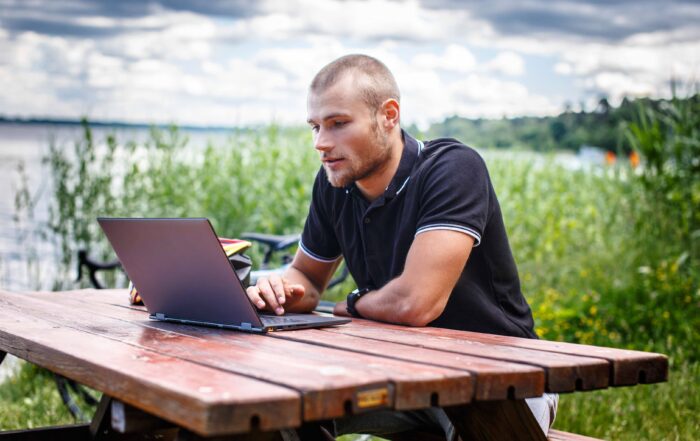man updates computer remotely with Hotpatch