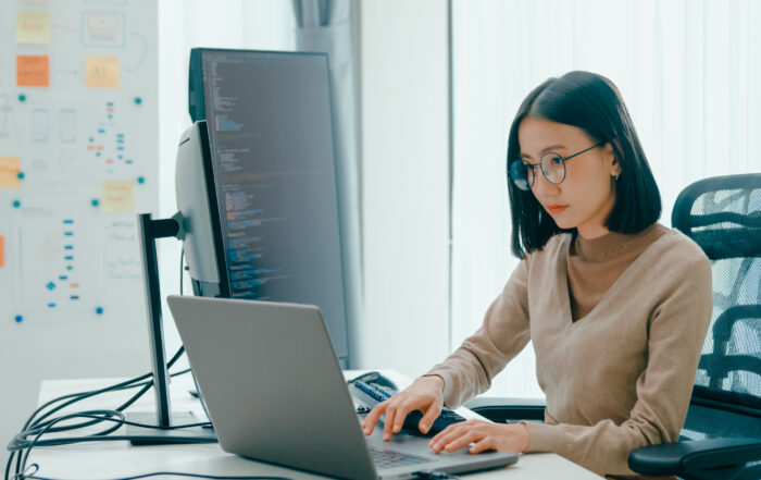 young professional working on laptop