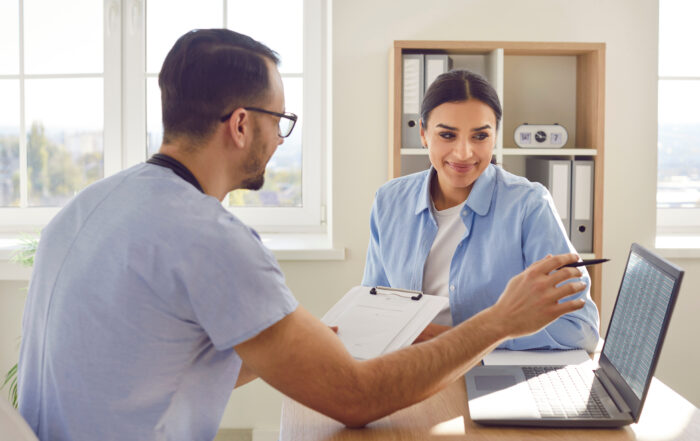 Medical consultation in front of laptop