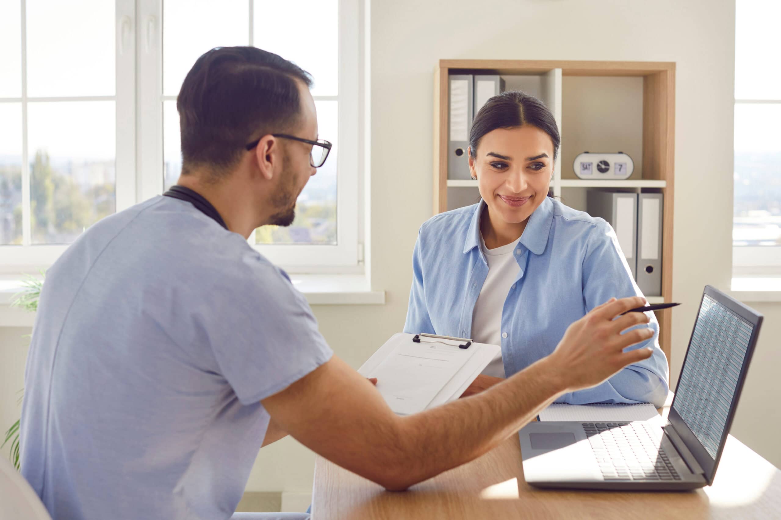 Medical consultation in front of laptop